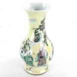 A Chinese yellow glaze porcelain vase, with painted figures and trees, 6 character mark, height 32cm