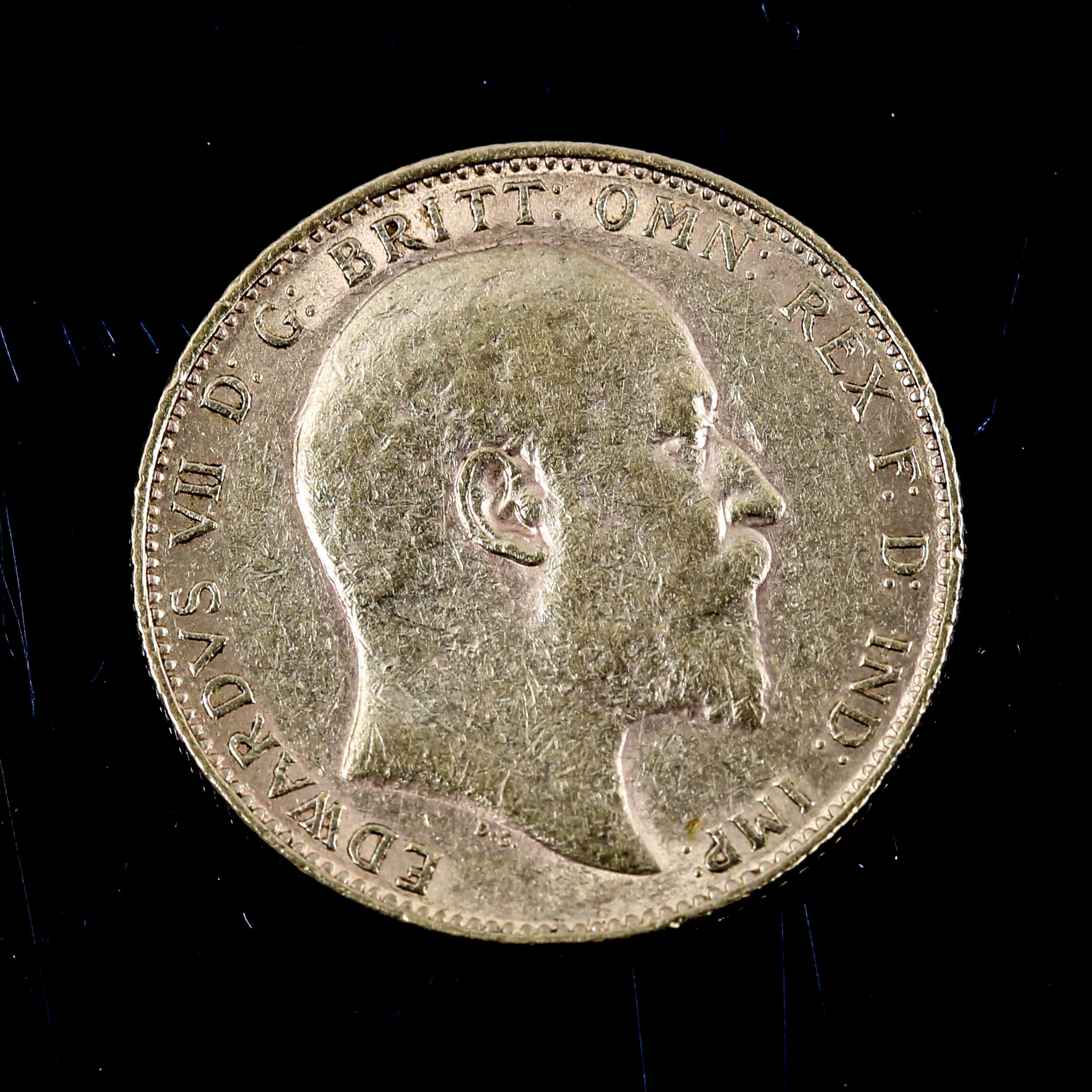 An Edward VII 1909 gold sovereign, 7.9g General wear and abrasions. - Image 2 of 3