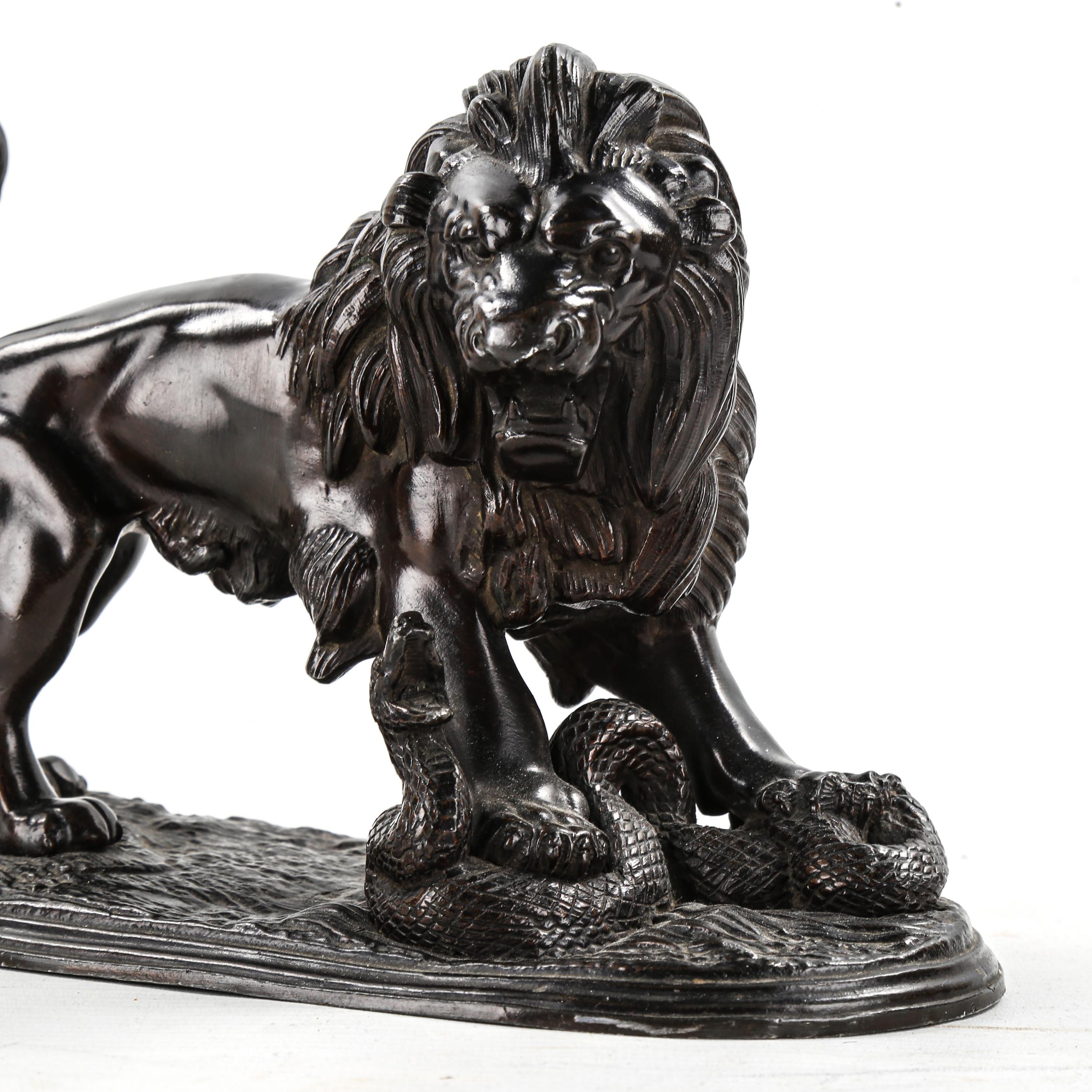 Victorian bronze patinated spelter sculpture, lion with a snake, length 21cm - Image 3 of 3