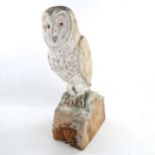 A carved and painted wood owl sculpture, height 64cm