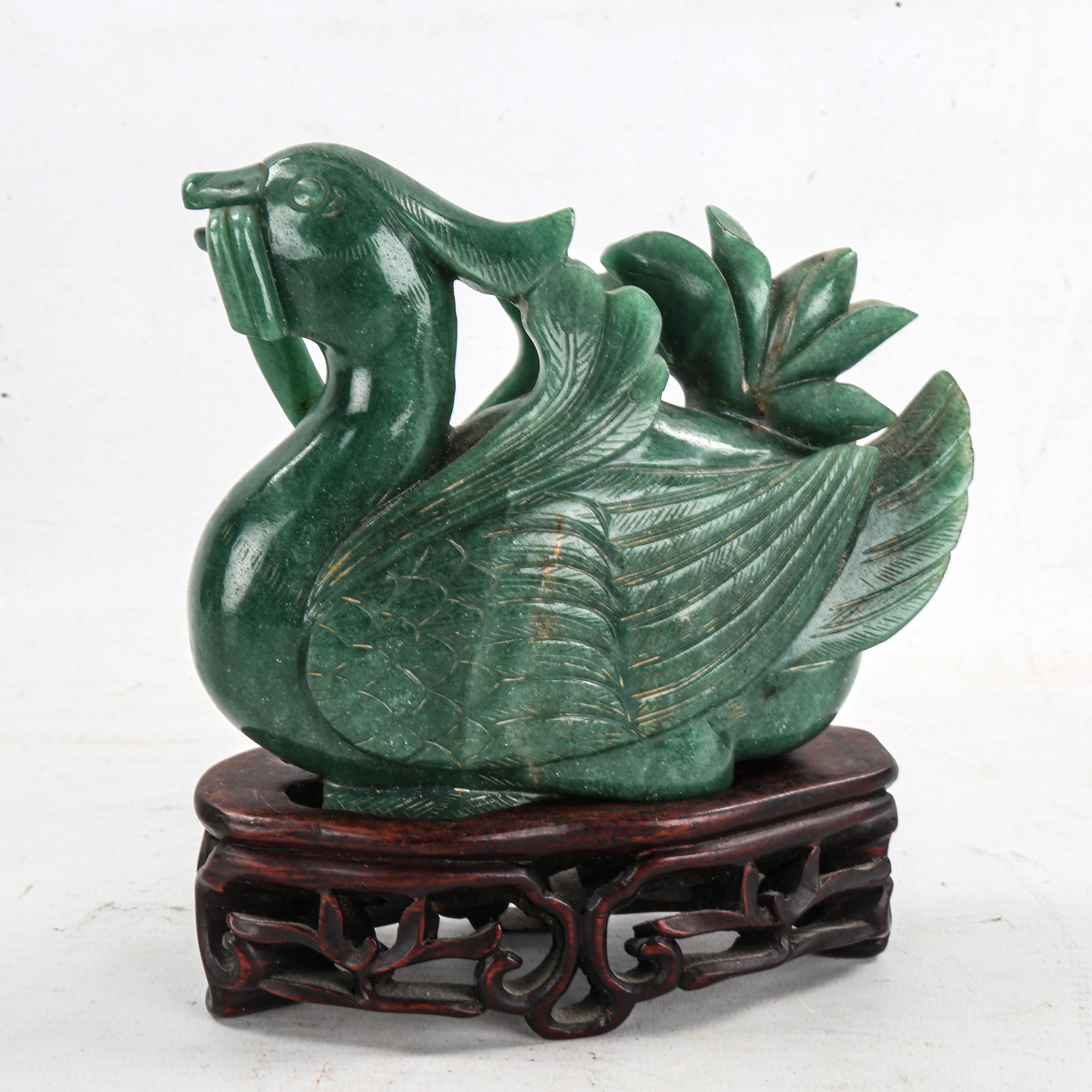 A Chinese carved greenstone bird, on hardwood stand, height 16cm - Image 2 of 3