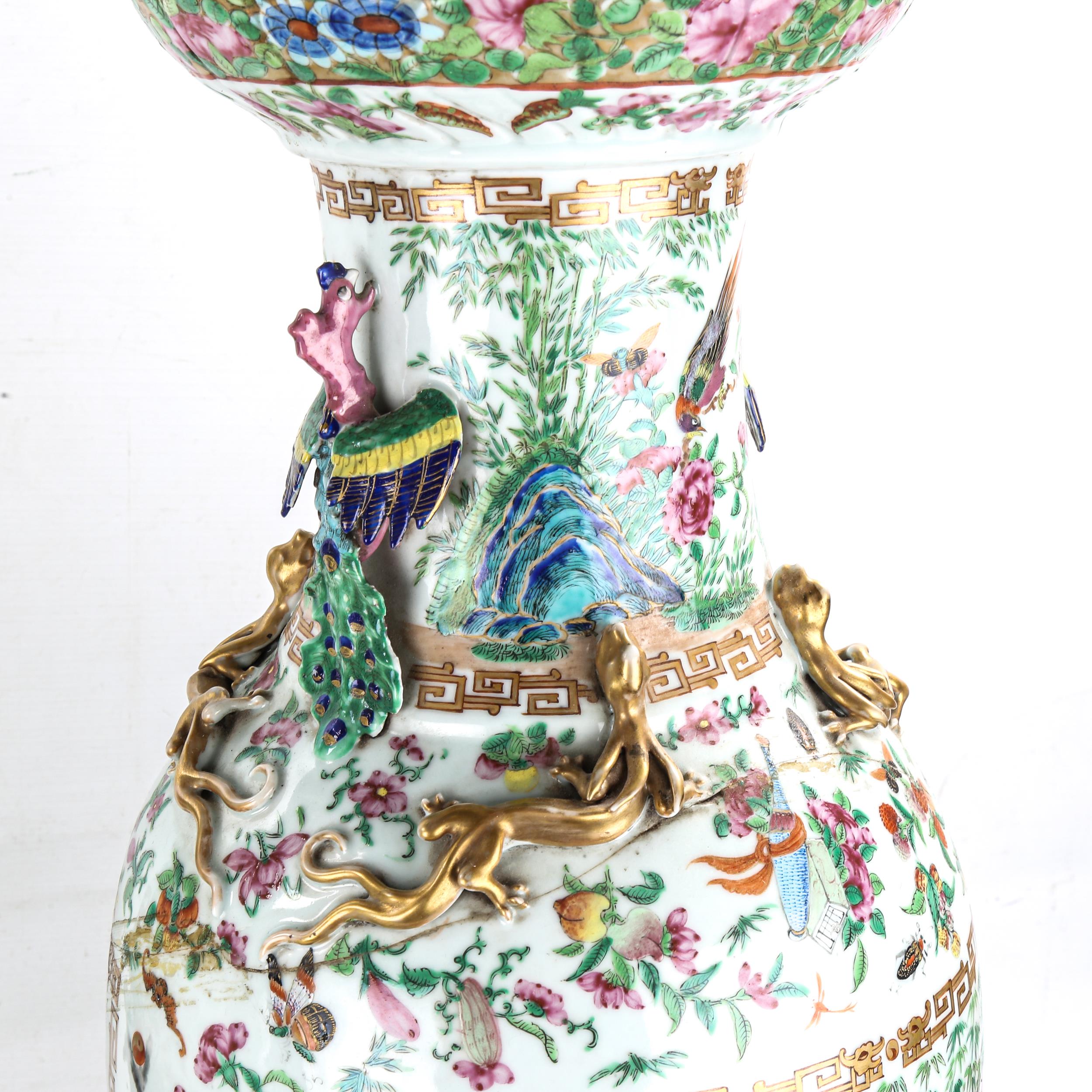 A pair of Chinese 19th century famille rose porcelain vases, with dragon and bird figures to the - Image 2 of 19