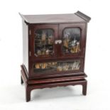 Fine quality Japanese lacquered kodansu table cabinet on stand, Meiji Period circa 1900, the 2