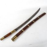 An Oriental sword, possibly Burmese, with brass bands and mounts, blade length 55cm