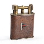 A Vintage Goliath cigar lighter, nickel plate brass body with leather covering, and enamelled