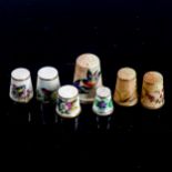 A group of 7 Worcester and Coalport China thimbles, largest height 3cm (7)