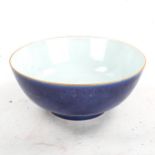 A Chinese blue and gilt porcelain bowl, diameter 27cm