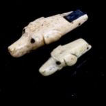 2 Antique carved bone dog's head design whistles, 18th or 19th century, length 7cm and 4.5cm
