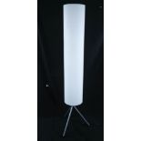 A tall acrylic cylinder floor lamp on metal tripod base, height 165cm