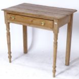 An Antique pine side table, with single frieze drawer on turned legs, W83cm, H74cm, D45cm