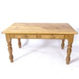 A rectangular polished pine kitchen table, 2 frieze drawers, on turned legs, L153cm, H76cm, D90cm