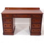 A Victorian mahogany twin-pedestal writing desk with fitted drawers, W122cm, H77cm, D56cm