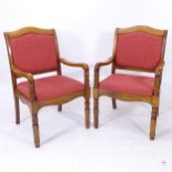 A pair of upholstered open armchairs