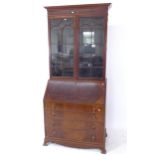 A 1930s Waring & Gillows mahogany 2-section bureau bookcase, W93cm, H209cm, D52cm