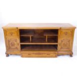 A modern oak open cabinet, with open shelves drawers and cupboards, L181cm, H82cm, D55cm