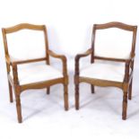 A pair of modern upholstered open armchairs, on turned legs