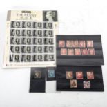A group of early postage stamps, including Penny Black and Penny Reds