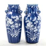 A pair of Chinese blue glaze porcelain vases, with floral decoration, height 24cm 1 vase has a