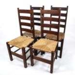 A set of 4 Heals Letchworth Arts and Crafts Letchworth ladder-back dining chairs, with rush seats,