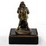 A Victorian cast-brass Vesta stand, in the form of a fisherman, on stained wood base, height 15cm