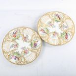 A pair of 19th Continental porcelain plates, with relief-moulded hand painted and gilded exotic