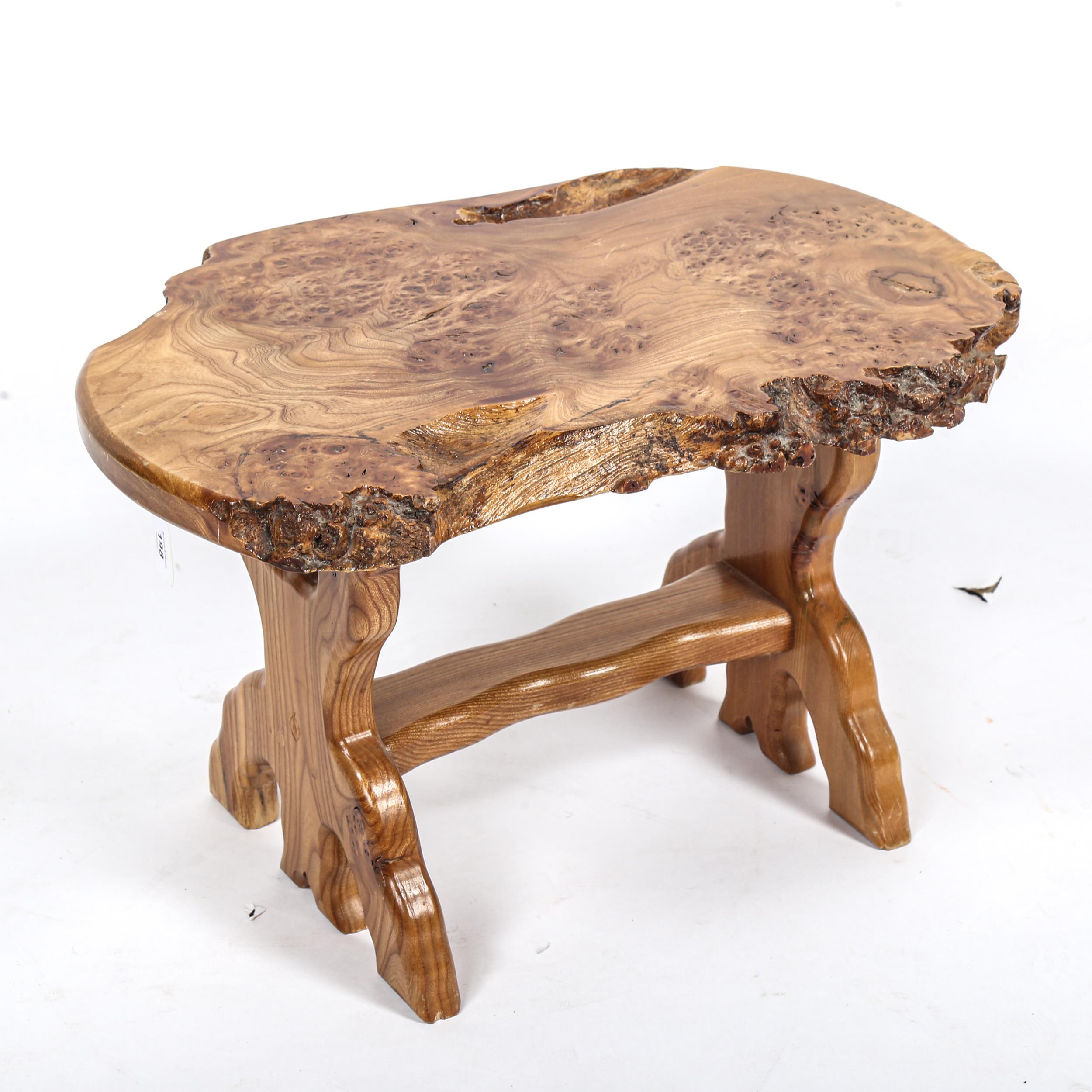 In the manner of Alan Grainger (The Acorn Man), a small burr-elm low table on stretcher base, length - Image 2 of 4