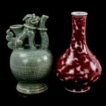 A Chinese red glaze narrow-neck vase with scroll decoration, 6 character mark, height 20cm, and a