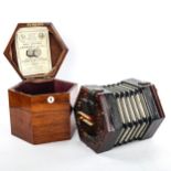 Lachenal & Co concertina, hexagonal rosewood and leather, 16cm across, in original hexagonal