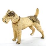 A cold painted metal novelty lighter in the form of an Airedale Terrier, mid-20th century, length
