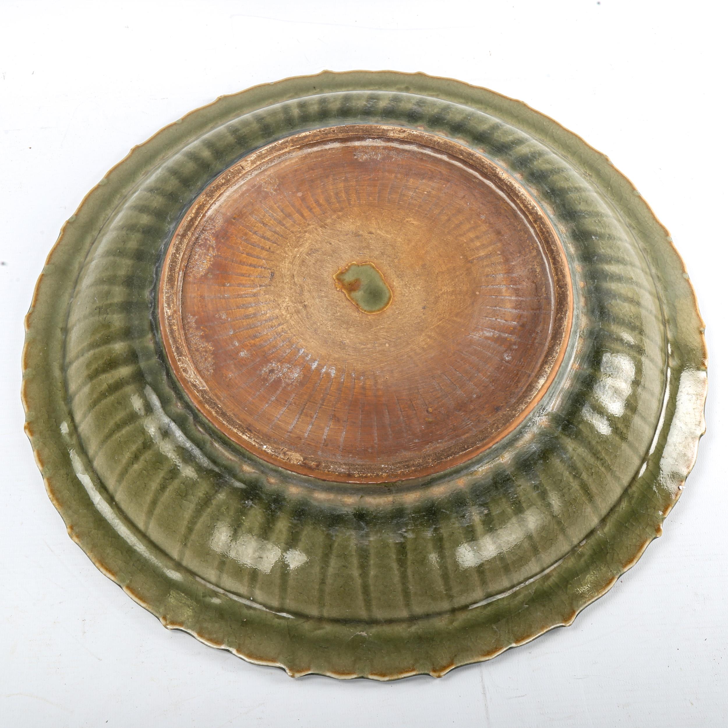 A Chinese celadon glaze porcelain bowl, with relief moulded fish design, diameter 44cm Slight - Image 3 of 3