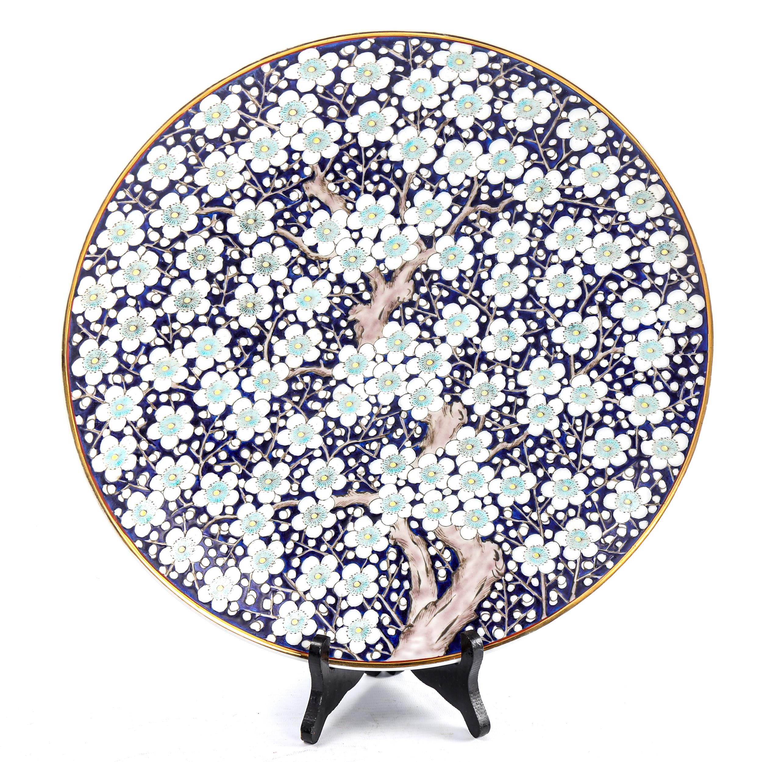 A Japanese porcelain charger with blossom tree decoration, diameter 36cm Perfect condition