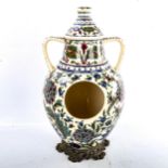 An Hungarian pottery lidded vessel on bronze base, height 42cm