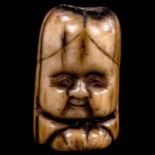 A carved staghorn netsuke of Fukurokuju, height 38mm