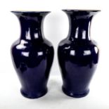 A large pair of cobalt blue ceramic vases, no marks, height 52cm