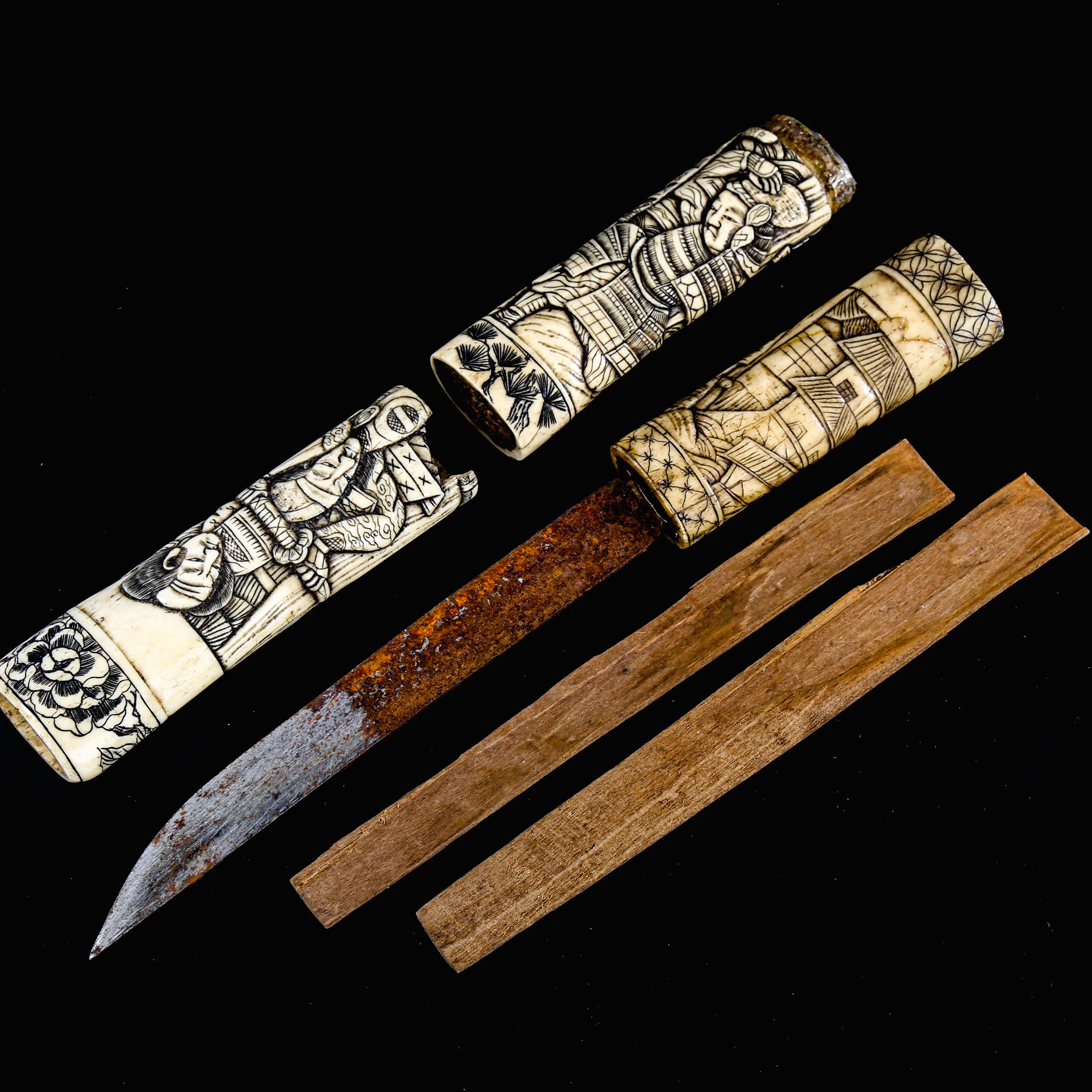 A Japanese relief carved bone dagger, Meiji Period circa 1900, decorated with Samurai Warriors, - Image 2 of 3
