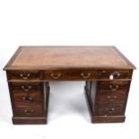 A late Victorian walnut pedestal desk, 137cm x 76cm (4'6" x 2'3")