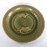 A Chinese celadon glaze porcelain bowl, with relief moulded fish design, diameter 44cm Slight