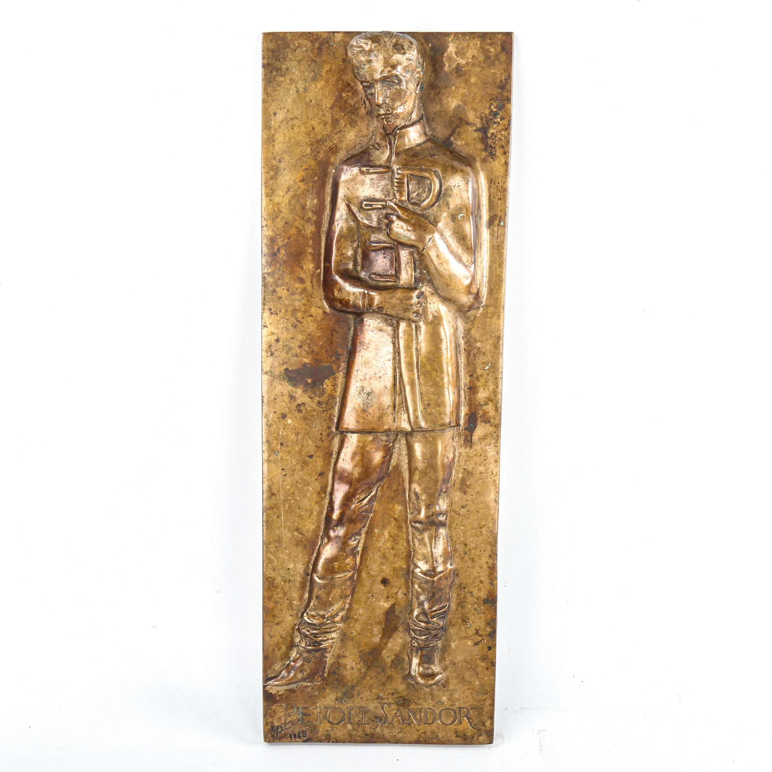 A relief cast bronze plaque depicting Petofi Sandor, signed with monogram MB dated 1948, 43cm x 15cm