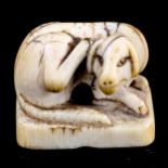 A Japanese ivory seal in the form of an animal, 19th century, length 3.5cm, height 3cm
