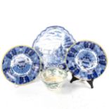 A pair of Makkum Tichelaar Delft plates, diameter 23cm, a Delft pottery wall plaque, height 36cm,