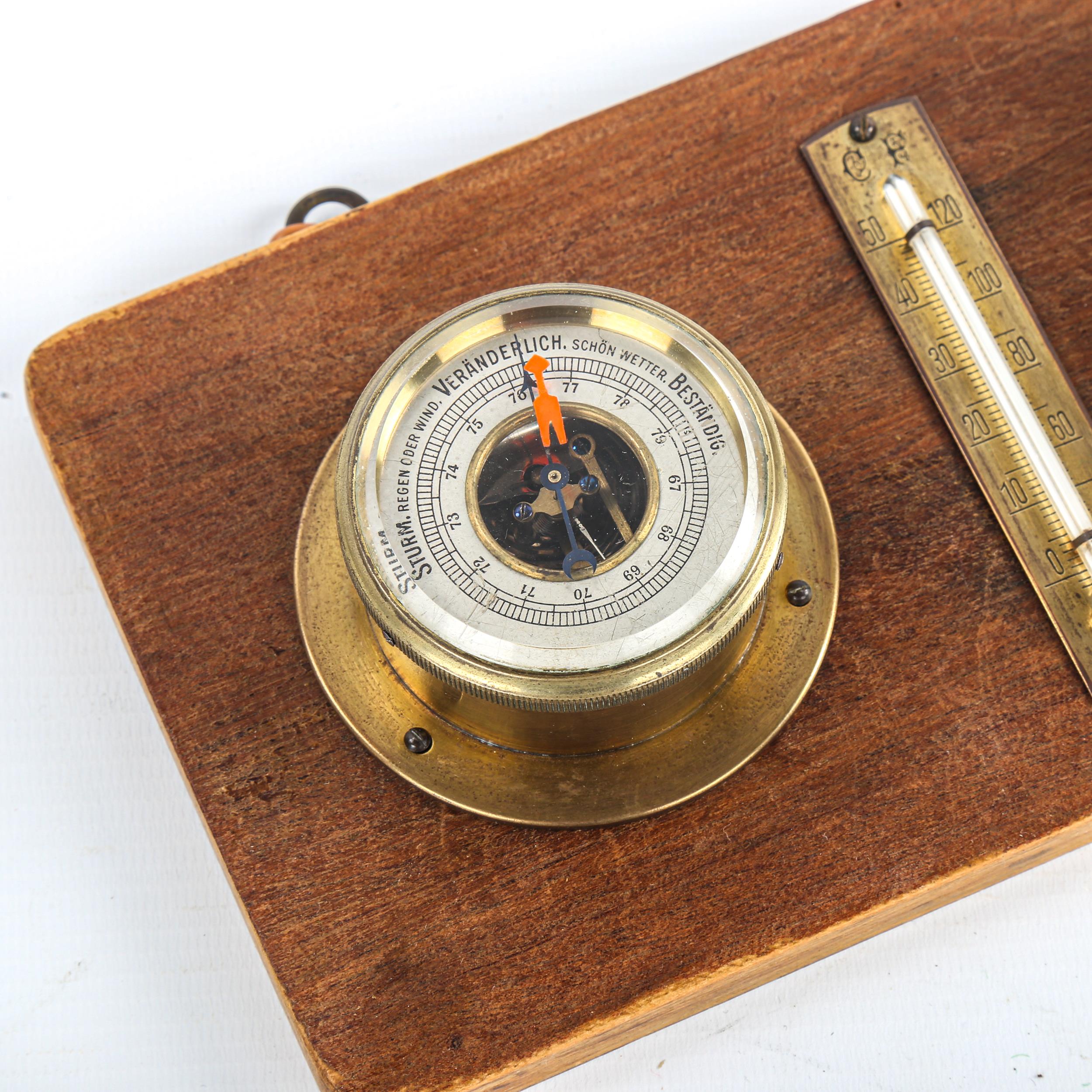 A wall-hanging combination aircraft clock/barometer/thermometer mounted on wooden plaque, clock dial - Image 2 of 3