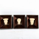 3 terracotta Medieval type heads mounted in wood frames, overall 13cm x 11cm