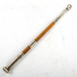A military swagger stick, wood with white metal mounts, understood to have been owned by Frank