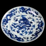 A Chinese blue and white porcelain dragon bowl, 6 character mark, diameter 27cm