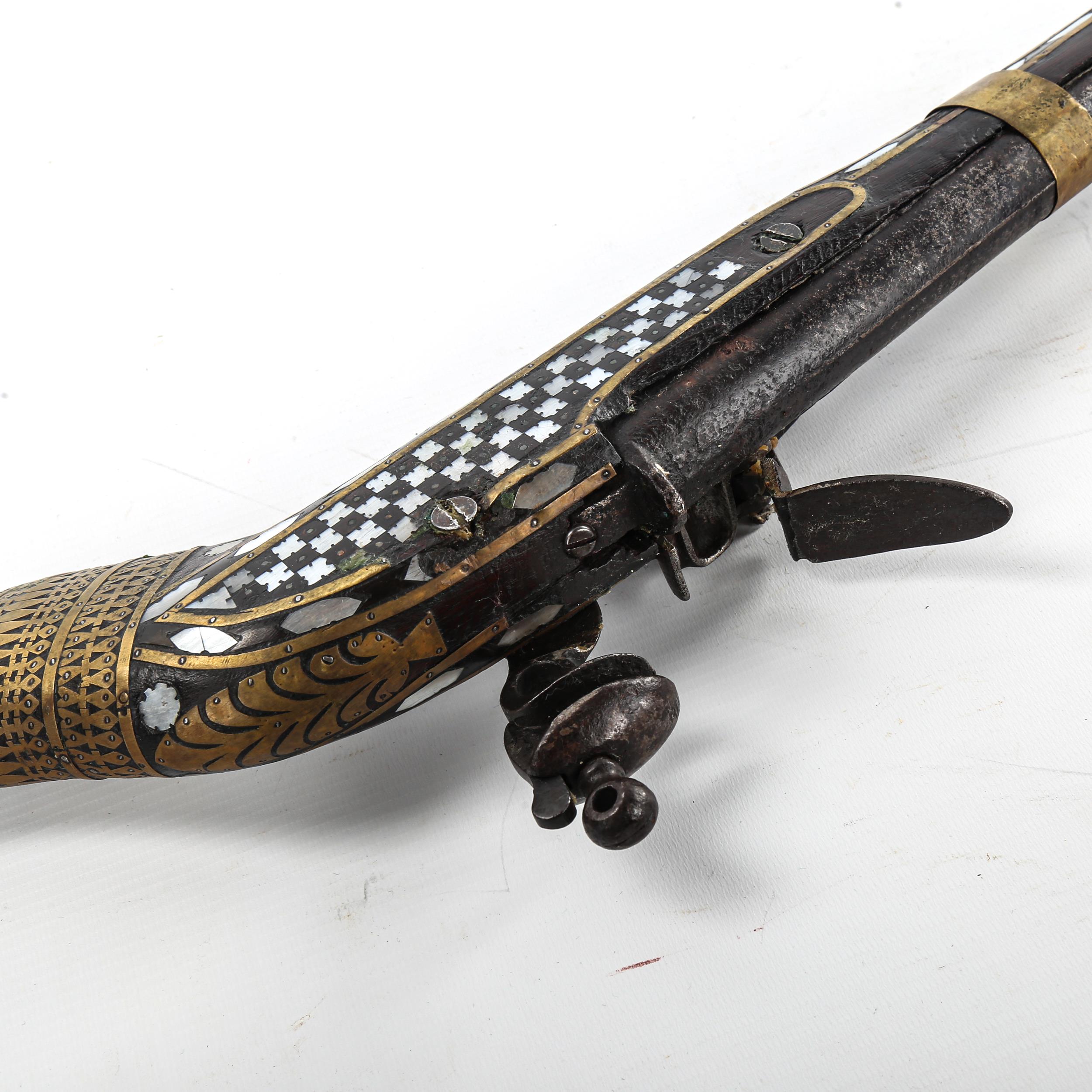 Antique Middle Eastern flintlock rifle, with inlaid brass and mother-of-pearl marquetry - Image 3 of 3