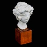 Eve Castle, white glaze ceramic sculpture, Classical head study on woodblock base, height 16cm Glaze
