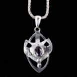 An Arts and Crafts amethyst pendant necklace, unmarked white metal settings, with leaf design and