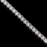 A modern sterling silver diamond tennis line bracelet, illusion set with single-cut diamonds,