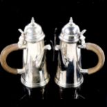 A pair of George V silver cafe au lait pots, in 18th century side pouring style, tapered cylindrical