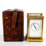 A large French brass-cased repeater carriage clock, white enamel dial with Arabic numerals, blued